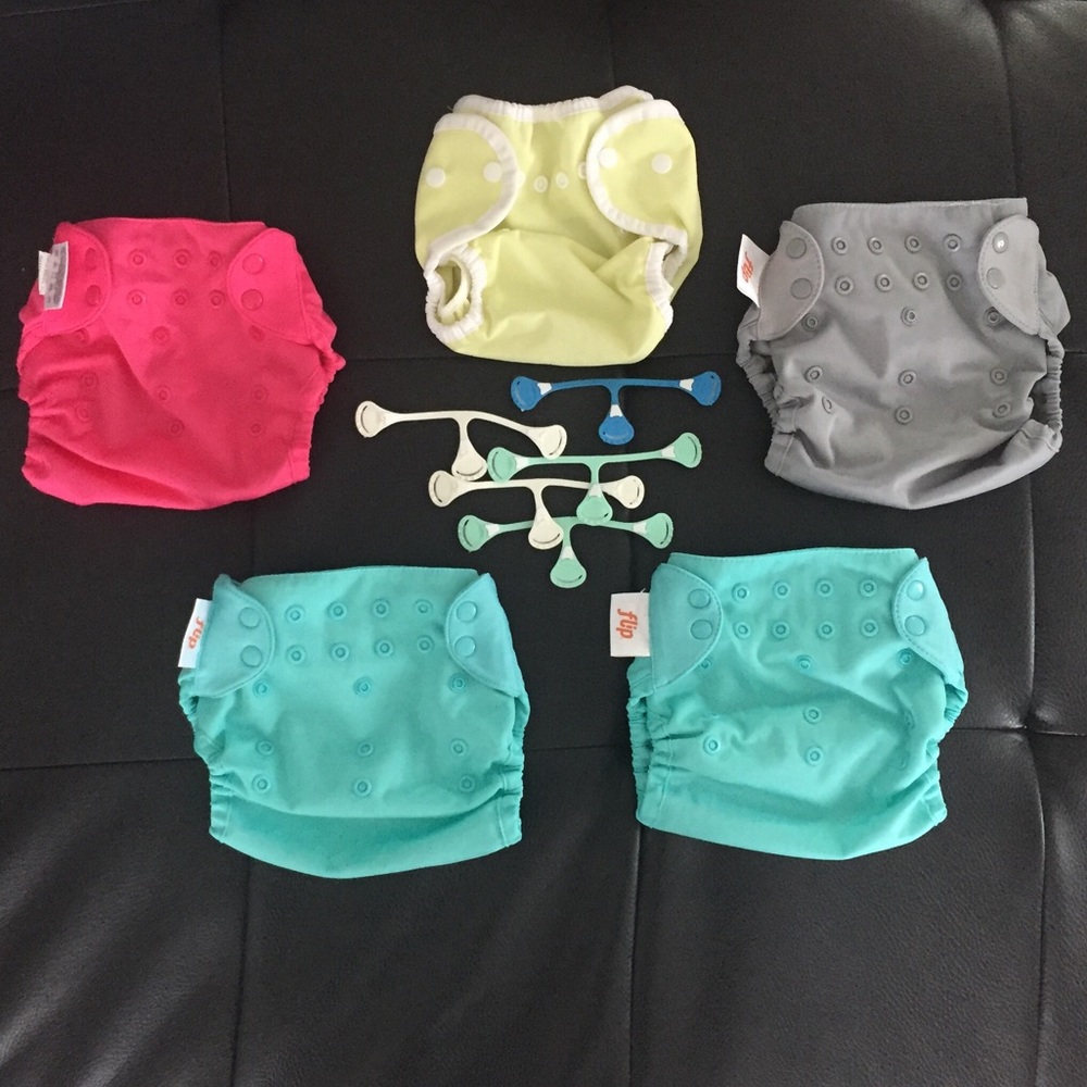 Diaper cover bundle with fasteners